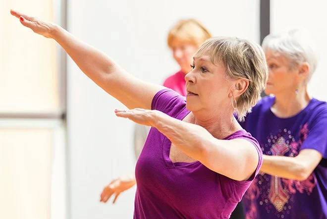 elderly women doing a fitness class