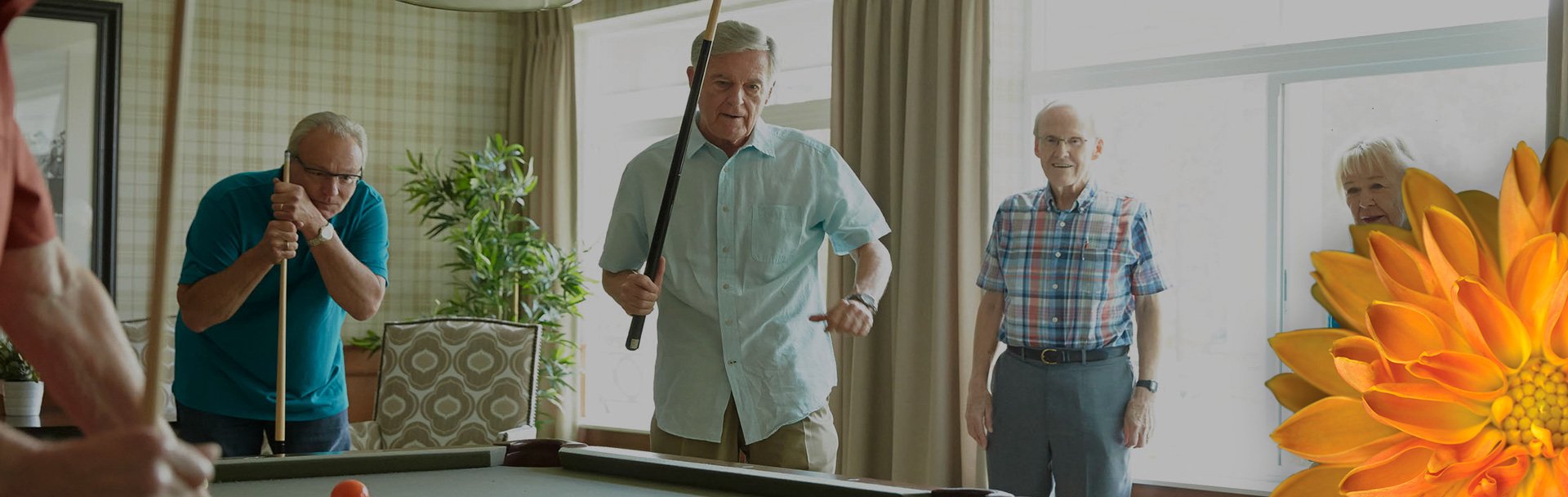 a group of older men playing pool