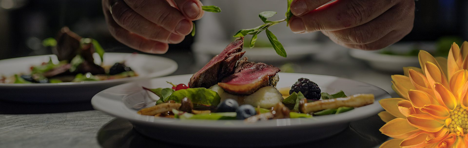 a chef plating food