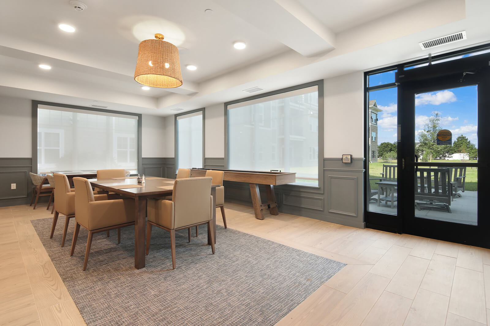 community room table and shuffleboard