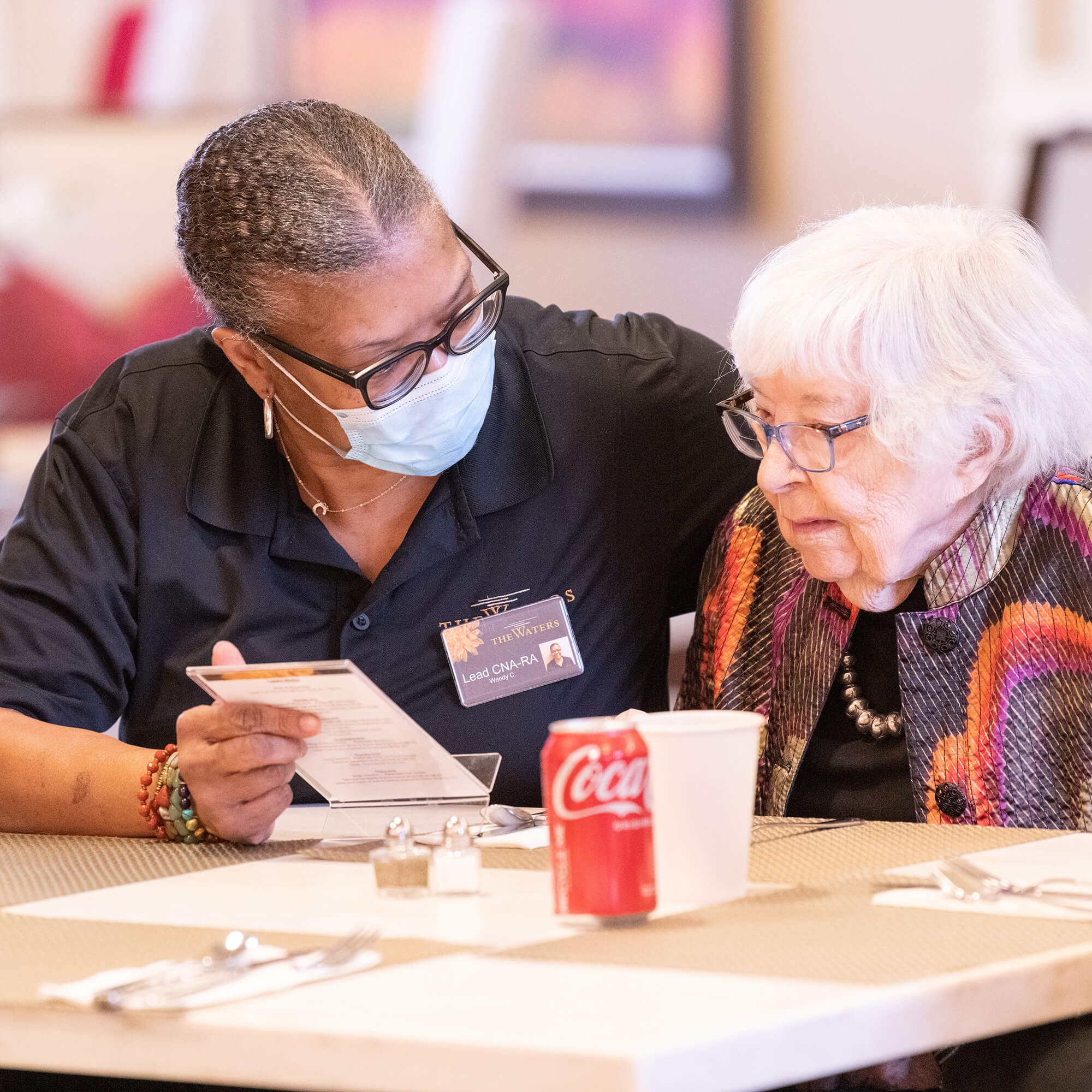 lead cna-ra wendy c. helping a resident