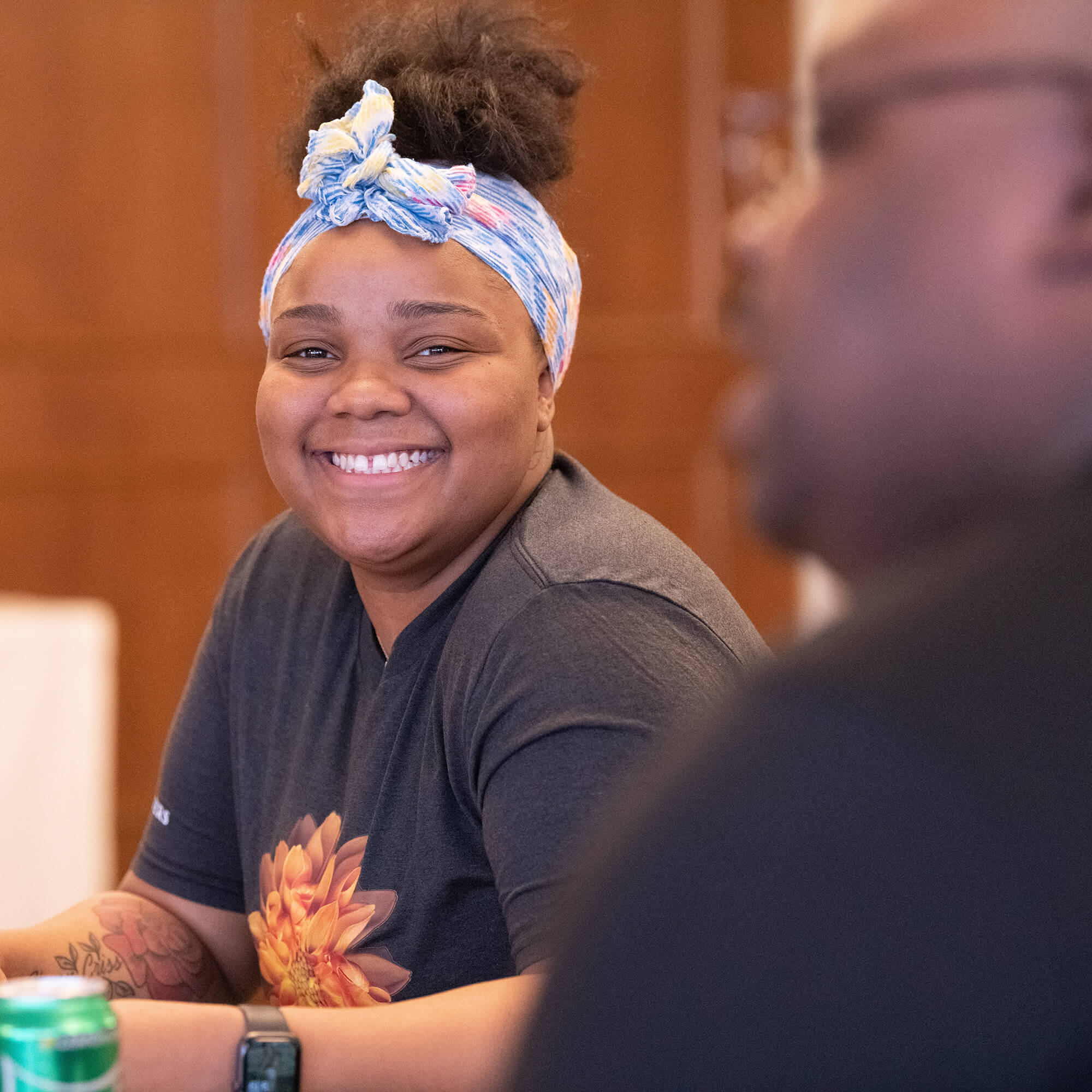 a female team member with a big bright smile