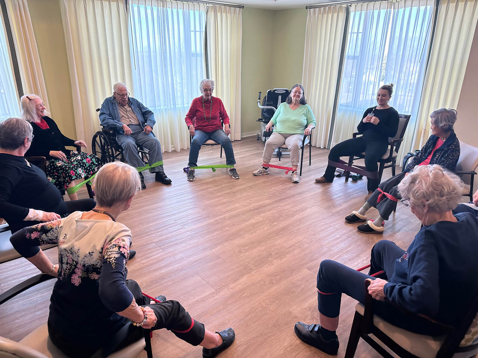 Seniors participating in a group exercise session at The Waters of Highland Park.