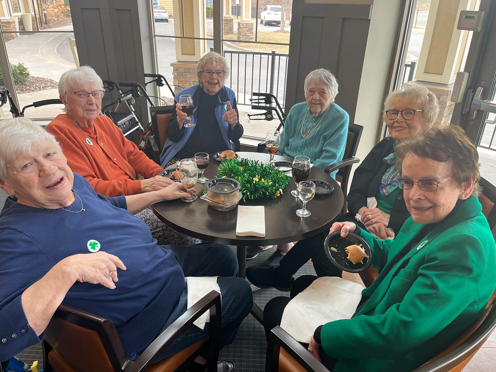 Seniors celebrating St. Patrick’s Day together at The Waters of Plymouth.