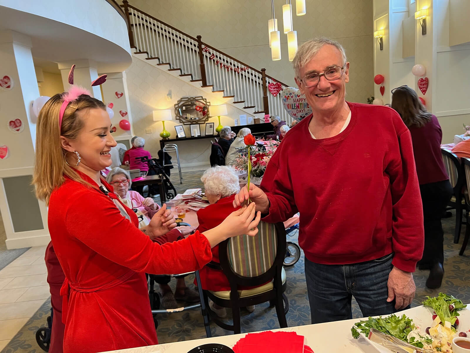 Residents enjoying a Valentine's Day dance at The Waters of Highland Park.