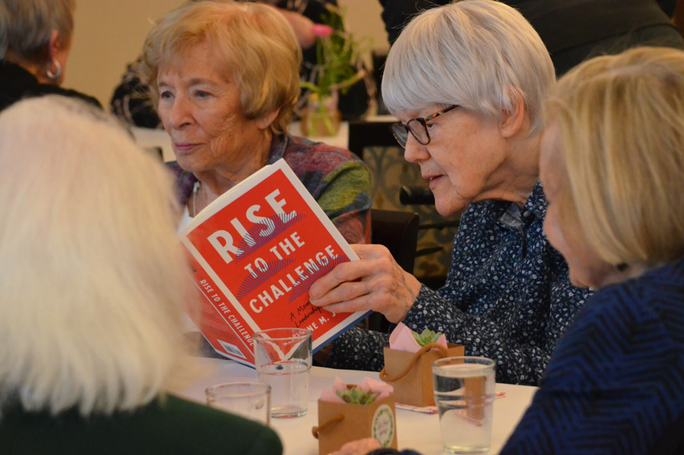 Resident looks through book